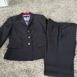 Dark blue suit blazer and pants.
